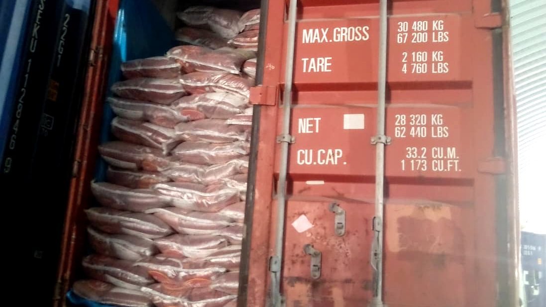 Export container close-up β bag stacking
